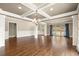 Elegant dining room boasts coffered ceiling, hardwood floors, and natural light at 2845 Echols Rd, Cumming, GA 30041