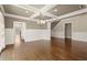 Inviting dining room with hardwood floors, coffered ceiling, and staircase at 2845 Echols Rd, Cumming, GA 30041
