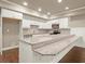 New kitchen island features granite countertops and stainless steel appliances at 2845 Echols Rd, Cumming, GA 30041
