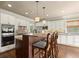 Kitchen with stainless steel appliances, granite counters, a brick backsplash, and ample storage space at 2845 Echols Rd, Cumming, GA 30041