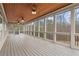 Spacious screened porch offering seamless indoor-outdoor living with wood ceiling, and panoramic views at 2845 Echols Rd, Cumming, GA 30041