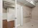 Accessible shower with grab bar and tile surround, and a view to the bathroom at 2845 Echols Rd, Cumming, GA 30041