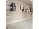 Spacious walk-in closet with adjustable shelving and hanging racks provides ample storage for an organized wardrobe at 2845 Echols Rd, Cumming, GA 30041