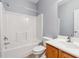 Bright bathroom featuring a vanity with a sink, toilet, and shower with a tub at 3310 Raes Creek Rd # 16, Marietta, GA 30008