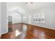 Inviting living space with hardwood floors, vaulted ceiling, and plantation shutters at 3310 Raes Creek Rd # 16, Marietta, GA 30008
