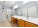 Main bathroom with a double sink vanity, large mirror and walk-in shower at 3310 Raes Creek Rd # 16, Marietta, GA 30008