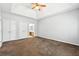 Spacious main bedroom with a tray ceiling, ceiling fan, and neutral decor at 3310 Raes Creek Rd # 16, Marietta, GA 30008