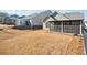 View of the home's backyard and screened in porch, with easy access at 410 Windy Ridge Way, Canton, GA 30114