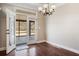 Dining room with hardwood floors and French doors leading to an outdoor space at 410 Windy Ridge Way, Canton, GA 30114