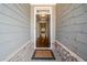 Inviting front entryway with stone accents and a view into the house at 410 Windy Ridge Way, Canton, GA 30114