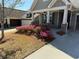 Charming home with a well-manicured front yard featuring beautiful pink flowers at 410 Windy Ridge Way, Canton, GA 30114