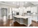 Spacious kitchen with a large island, white cabinets, and stainless steel appliances at 410 Windy Ridge Way, Canton, GA 30114