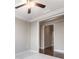 A living room features neutral walls, hardwood flooring, and white trim and a ceiling fan at 410 Windy Ridge Way, Canton, GA 30114