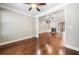 Open living room with hardwood floors and a cozy fireplace at 410 Windy Ridge Way, Canton, GA 30114