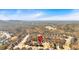 A serene aerial view of the neighborhood showcases the home's location amidst lush greenery and well-planned streets at 257 Lakestone Pkwy, Woodstock, GA 30188