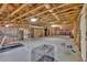 Large unfinished basement featuring concrete floors and exposed ceiling framework, with plenty of open space for various uses at 257 Lakestone Pkwy, Woodstock, GA 30188