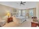 Bedroom featuring a decorative bed, neutral walls, and natural light at 257 Lakestone Pkwy, Woodstock, GA 30188