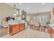 An open-concept kitchen featuring stainless steel appliances, and an adjacent dining area at 257 Lakestone Pkwy, Woodstock, GA 30188