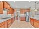 Spacious kitchen features modern appliances, stone counters, and lots of cabinet space at 257 Lakestone Pkwy, Woodstock, GA 30188