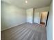 Spacious bedroom featuring plush carpeting, ample closet space, and natural light at 2624 Mourning Dove Drive (Lot 42), Grayson, GA 30017