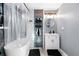 Updated bathroom featuring modern fixtures and shower/tub combination with updated tile at 368 Triumph Se Cir, Atlanta, GA 30354