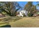 Charming home with a spacious lawn, mature trees, and inviting curb appeal at 368 Triumph Se Cir, Atlanta, GA 30354