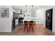 Eat-in kitchen with stainless steel appliances, an island with seating, and laundry hookups at 368 Triumph Se Cir, Atlanta, GA 30354