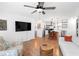 Open concept living room with views of the modern kitchen and access to other living areas at 368 Triumph Se Cir, Atlanta, GA 30354