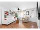 Bright living room featuring hardwood floors, white walls, and lots of natural light at 368 Triumph Se Cir, Atlanta, GA 30354