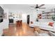 Inviting living room adjacent to the kitchen with modern appliances and stylish decor at 368 Triumph Se Cir, Atlanta, GA 30354