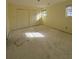 A bedroom with two windows, double closets, and space for personalization at 7123 Williamsburg Dr, Riverdale, GA 30274