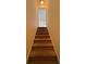 A carpeted staircase leading to the next level of the home at 7123 Williamsburg Dr, Riverdale, GA 30274