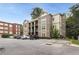 Three-story apartment complex with brick and parking for residents at 1903 Anjaco Rd # 5, Atlanta, GA 30309