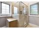 Modern bathroom features a glass shower, tiled walls, and natural lighting at 1903 Anjaco Rd # 5, Atlanta, GA 30309