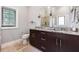 The primary bathroom offers granite countertops, and sinks, and plenty of cabinet space at 1903 Anjaco Rd # 5, Atlanta, GA 30309