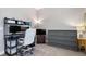 Multi-functional bedroom with computer desk, shelving, and a chest of drawers for neat storage solutions at 1903 Anjaco Rd # 5, Atlanta, GA 30309