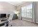 Bright room with large window, closet space, and chest of drawers for a flexible bedroom/office space at 1903 Anjaco Rd # 5, Atlanta, GA 30309