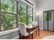 Cozy dining area boasts large windows for abundant natural light and scenic wooded views at 1903 Anjaco Rd # 5, Atlanta, GA 30309