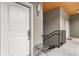 Entrance to condo with neutral walls, a small table and white door with a number five sign at 1903 Anjaco Rd # 5, Atlanta, GA 30309