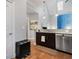 The kitchen features granite countertops, stainless steel appliances, and light hardwood floors at 1903 Anjaco Rd # 5, Atlanta, GA 30309
