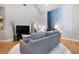 Spacious living room features hardwood floors, a comfortable sofa, and a tranquil ambiance at 1903 Anjaco Rd # 5, Atlanta, GA 30309