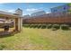 Large grassy backyard with a patio area, ideal for recreation and relaxation at 416 Culloden Moor Dr, Mcdonough, GA 30253
