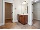 Bathroom vanity between and walk in closets, complete with ample counter space and great lighting at 416 Culloden Moor Dr, Mcdonough, GA 30253