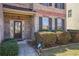 Close-up of the home's front door with brick facade and neatly trimmed landscaping at 416 Culloden Moor Dr, Mcdonough, GA 30253