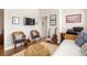 Well-lit bedroom with a daybed and work area at 240 Mado Ln, Chattahoochee Hills, GA 30268