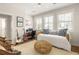 Versatile bedroom with daybed, desk, and space for work or relaxation at 240 Mado Ln, Chattahoochee Hills, GA 30268