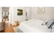Bedroom featuring neutral decor with light hardwood floors and white walls at 240 Mado Ln, Chattahoochee Hills, GA 30268