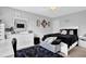 Bedroom boasts a plush rug, sleek desk and ample natural light at 3000 Storybook Ln, Grayson, GA 30017