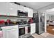 Modern kitchen features stainless steel appliances, sleek countertops, and white cabinets at 3000 Storybook Ln, Grayson, GA 30017