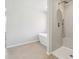 Modern bathroom featuring a soaking tub, stand up shower, and gray tile at 345 Orwell Dr, Social Circle, GA 30025